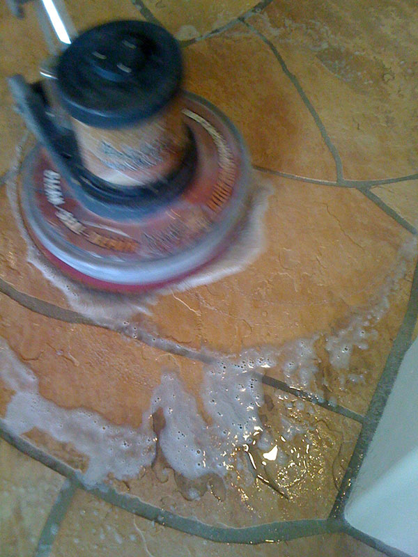 Flagstone floor in the process of being restored - AZ Tile and Grout Care Tucson